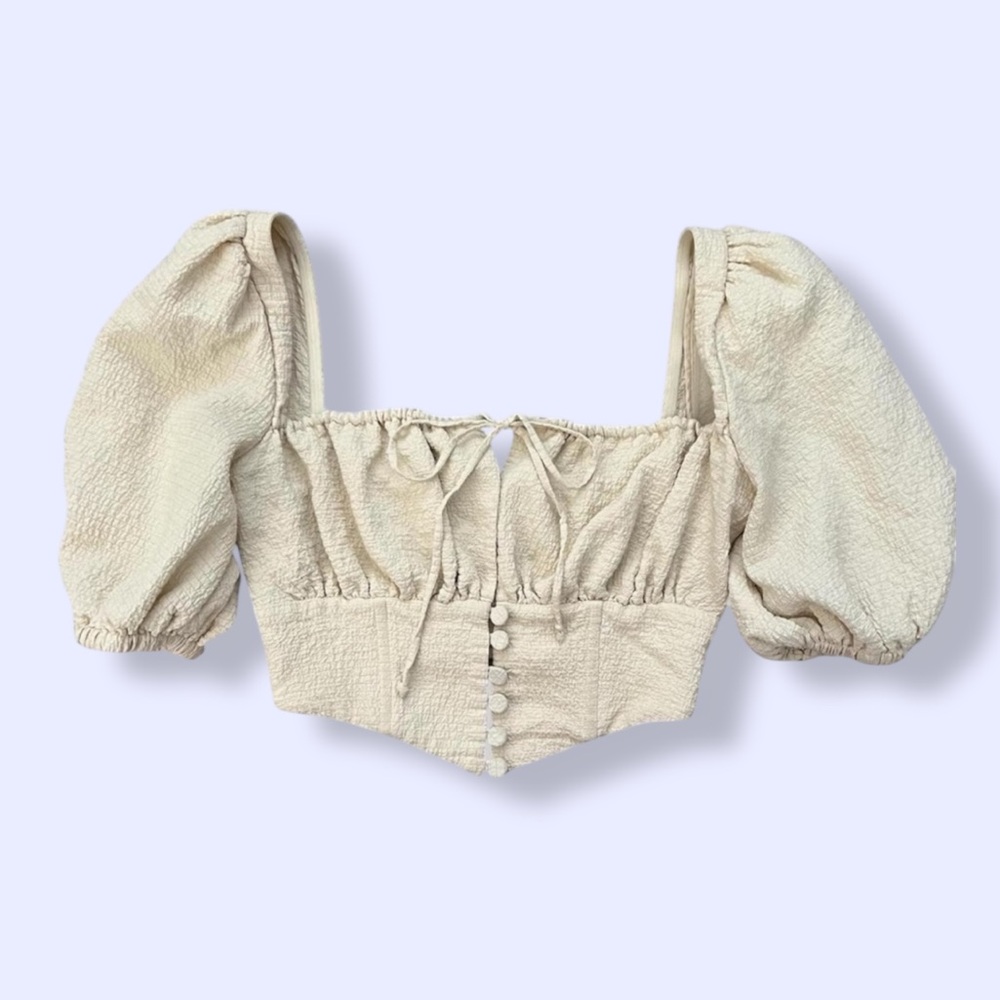 Revolve LPA cream, textured puff sleeve milk made corset style top